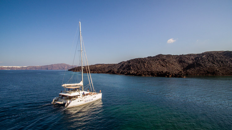 Lagoon 560 Catamaran Sailing Around Santorini