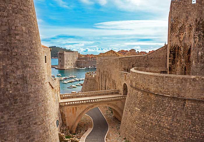 Dubrovnik old port and walls, Luxury vacation Dubrovnik Split Zagreb Rovinj, Travelive