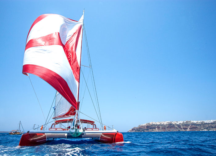 Catamaran cruise – tour Santorini island with Travelive’ s Greek island honeymoon packages