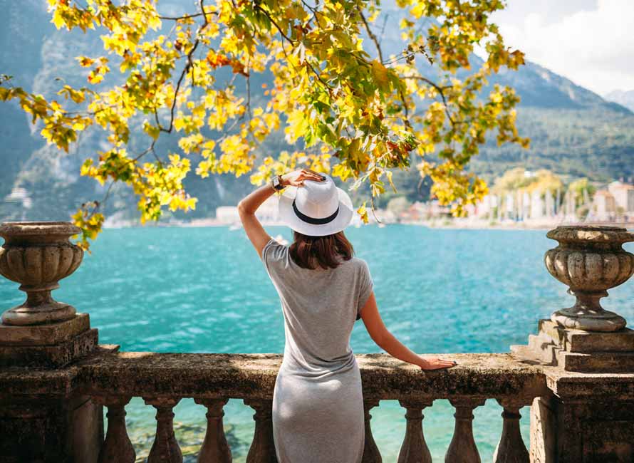 Woman Overlooking Lake Como – Luxury Travel to Italy by Travelive