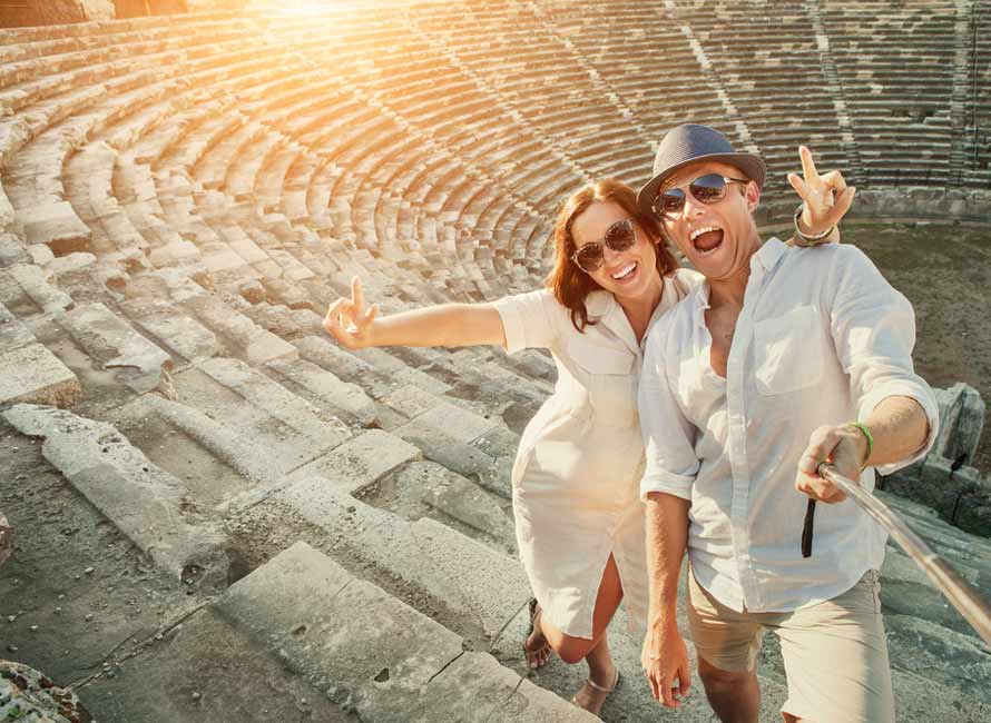 Couple at Amphitheater in Turkey, Luxury Honeymoon Packages, Travel to Turkey